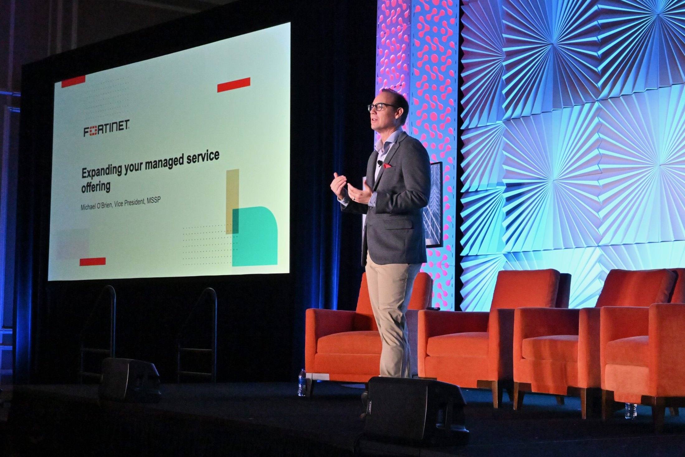 Travis Woods presenting a session on expanding a managed service offering at a channel conference